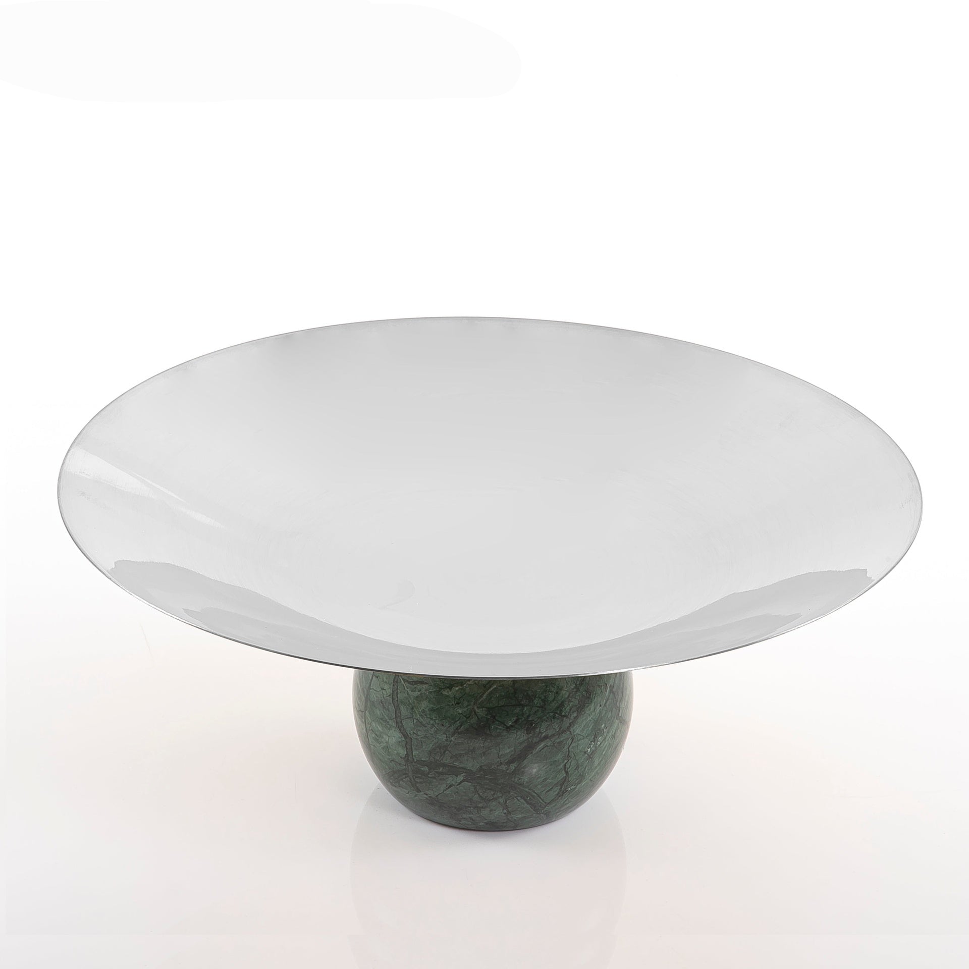 Green marble stand with a large silver metal plate