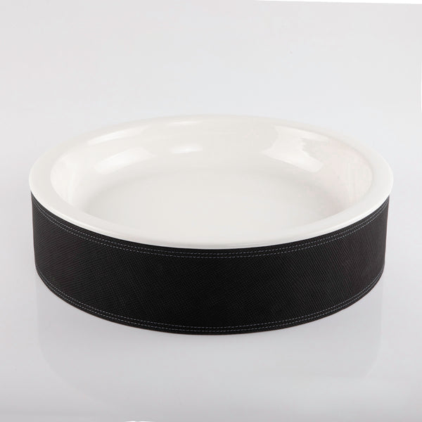 Ceramic plate with leather base