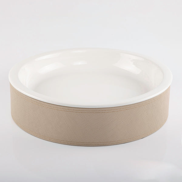 Ceramic plate with leather base