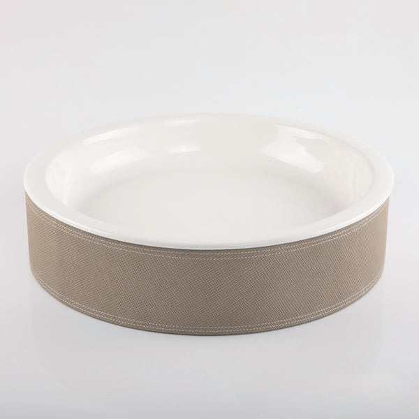 Ceramic plate with leather base