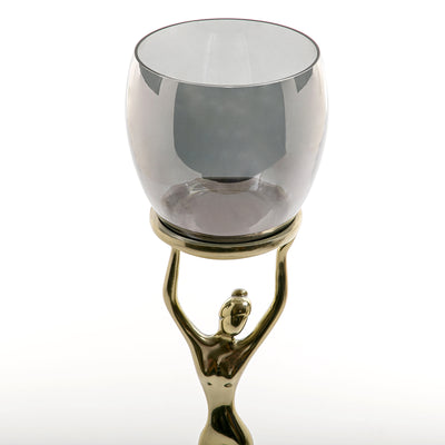 حامل شموع معدني باللون الذهبي