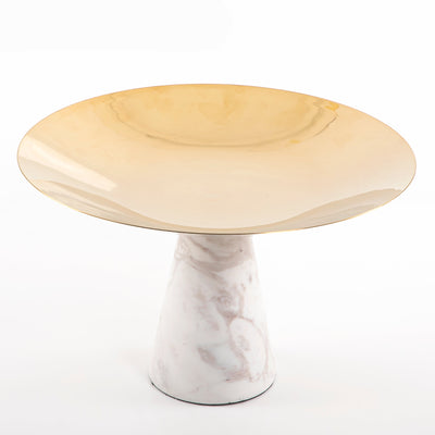 Marble stand with a large golden metal plate