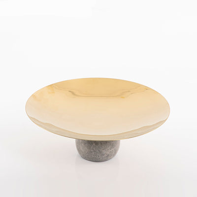 Marble stand with a small golden metal plate