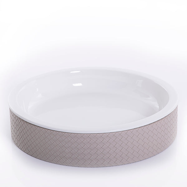 round ceramic plate with beige leather base