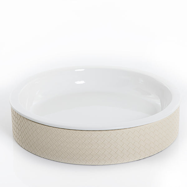 round ceramic plate with white leather base