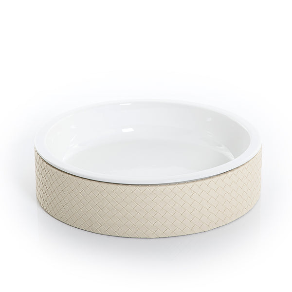 round ceramic plate with white leather base