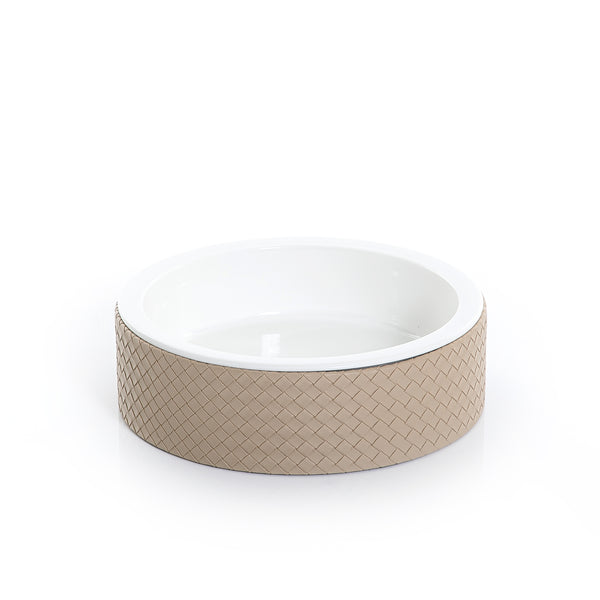 round ceramic plate with light brown leather base