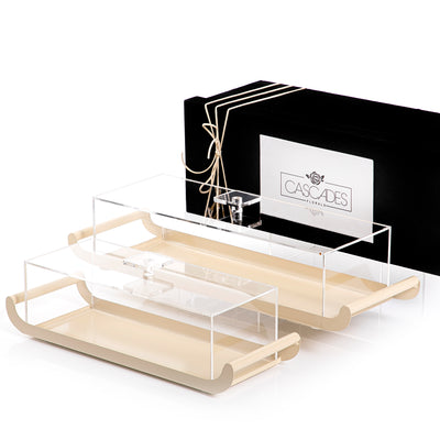 2 beige rectangular metal trays with acrylic covers