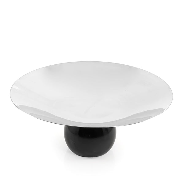 Black marble stand with a large silver metal plate